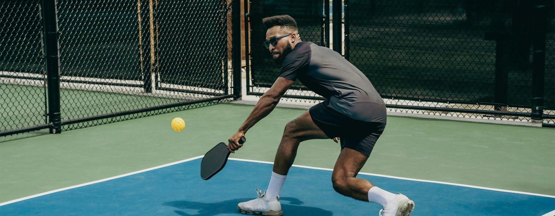 a person playing pickleball