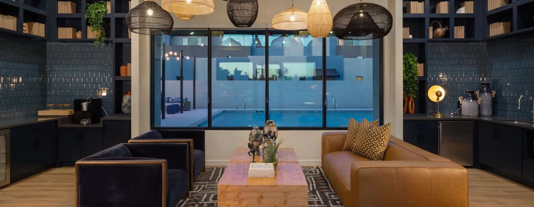 a spacious lounge with a resident kitchen